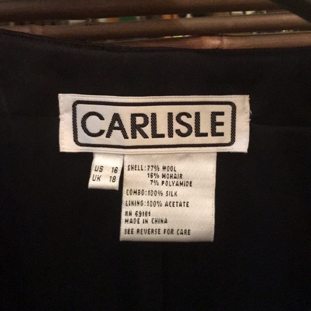 Vintage Carlisle black suit , jacket and skirt.